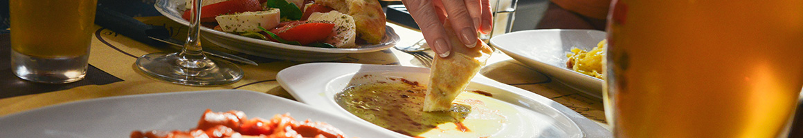 Eating Greek Mediterranean at The Grape Leaf restaurant in Louisville, KY.